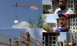 Ücretlerini alamayan işçilerden vinçli protesto
