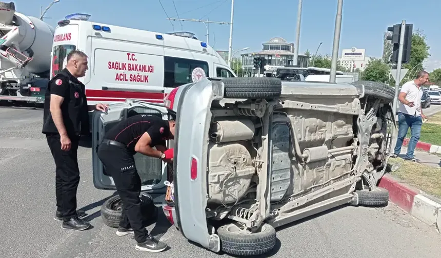Yan yatan otomobilden sürücü yara almadan kurtuldu